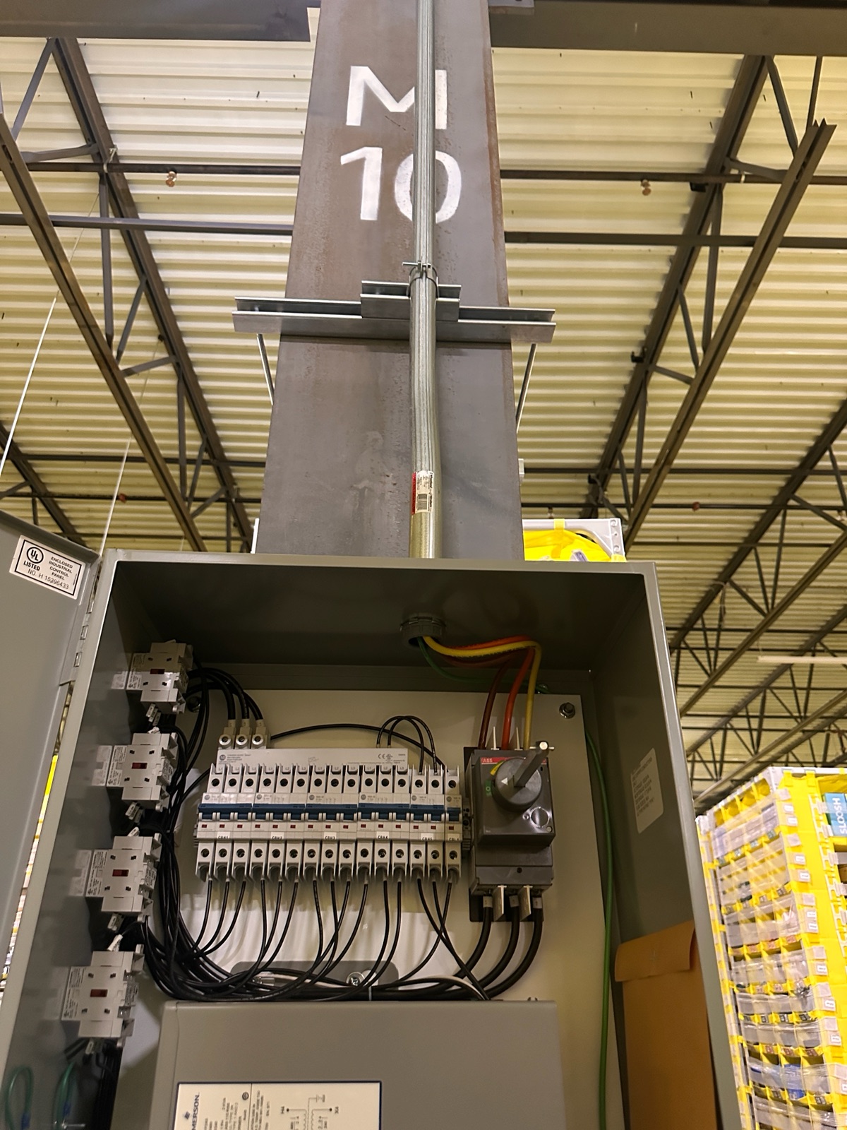 Open PDU panel showing breakers, disconnect, and terminated wiring